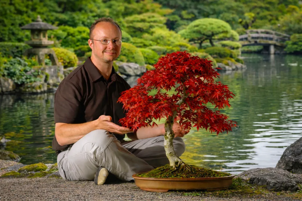 Lloyd with his favourite Japanese Red Maple (Acer palmatum deshojo) which has been growing for decades.